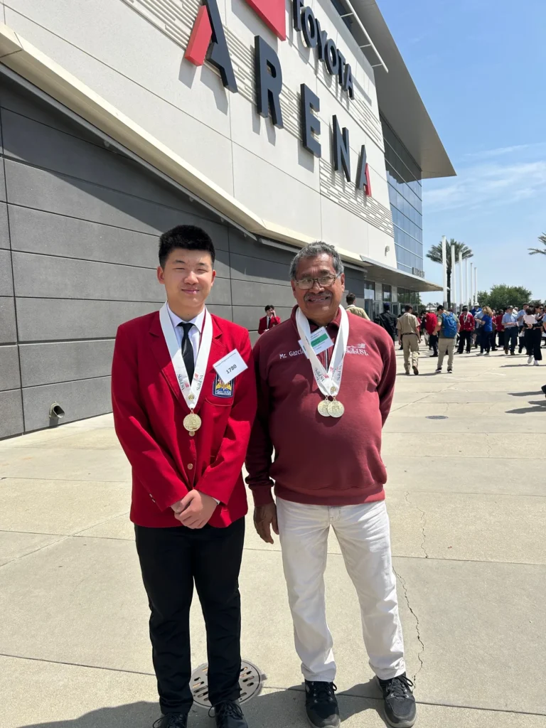 Me (right) with my advisor (left) after the awards ceremony.
